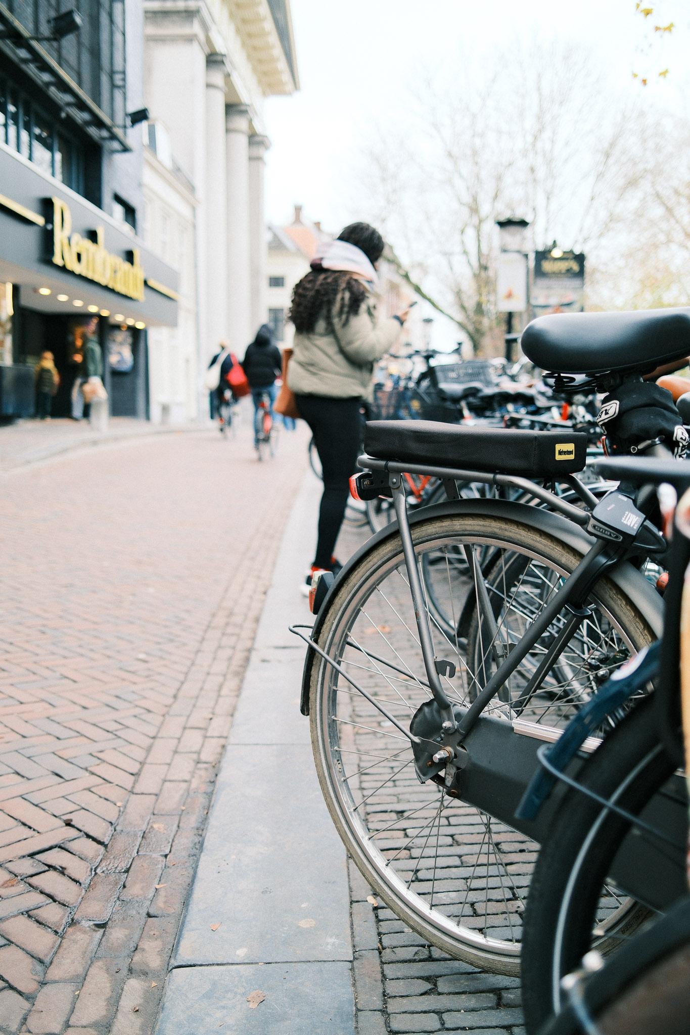 parked bikes on a street in Utrecht