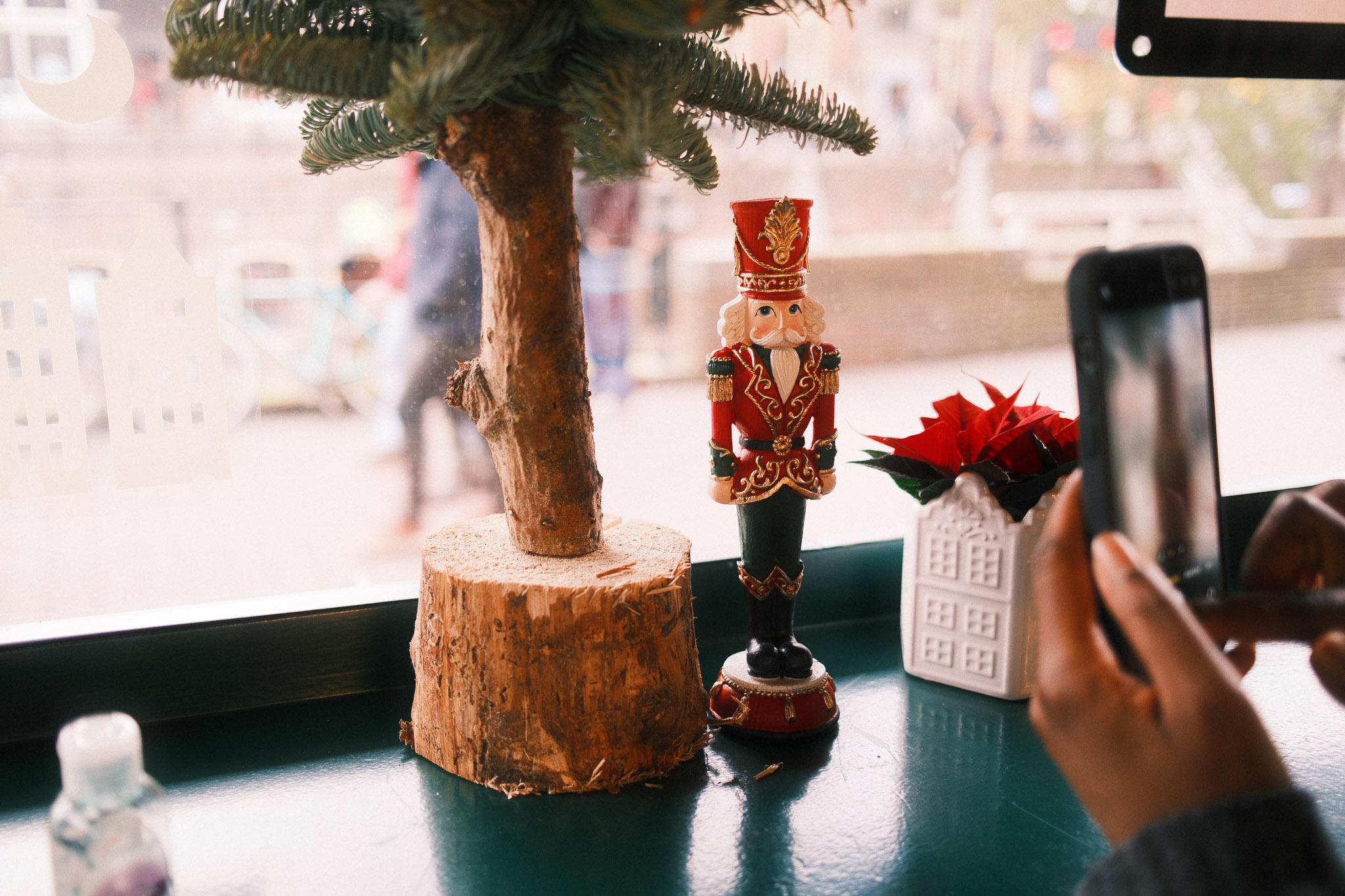 festive character on top of a table inside the restaurant, Off Smash