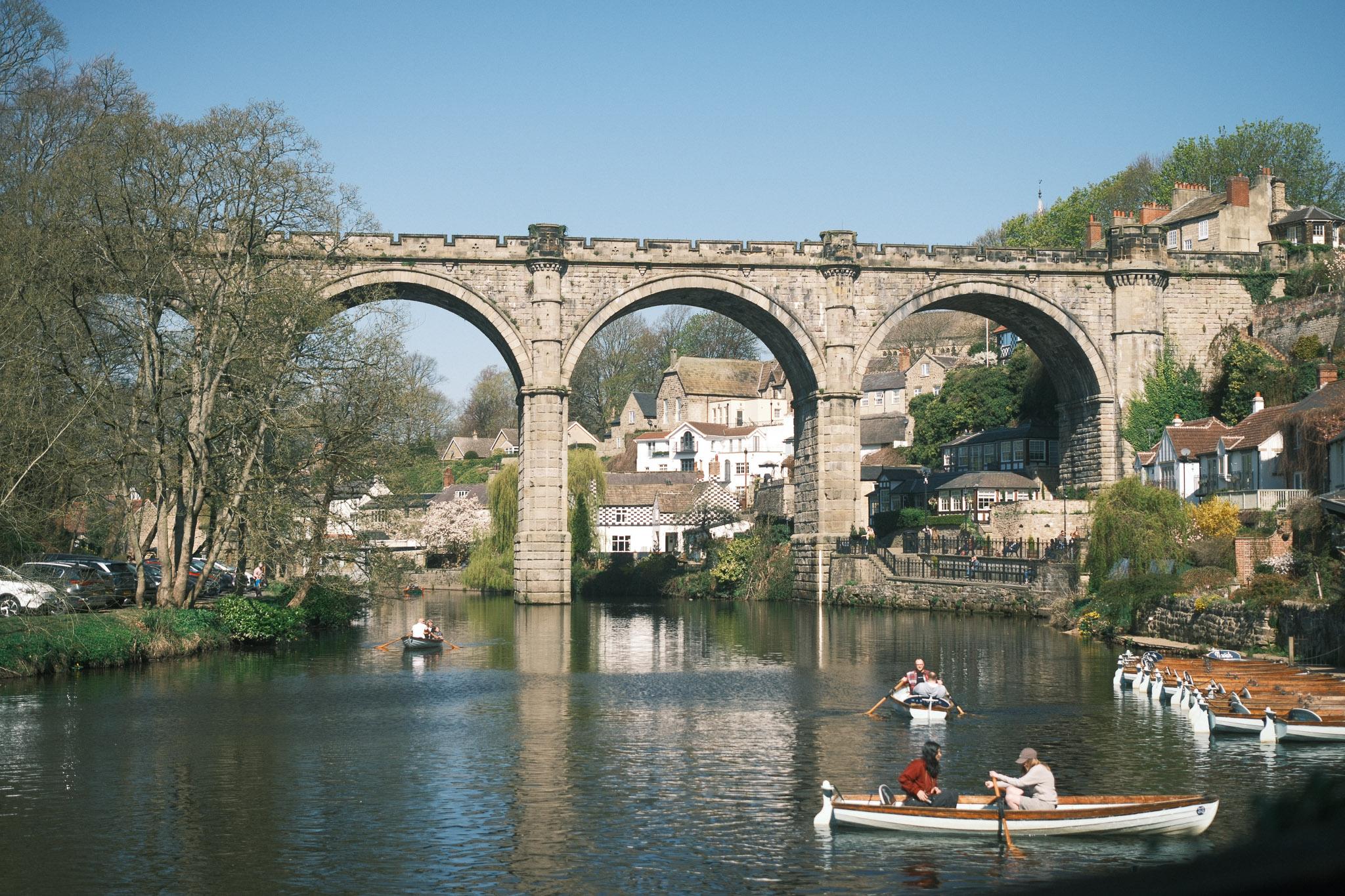 beautiful, scenic railway bridge spanning over a lake in Knaresborough